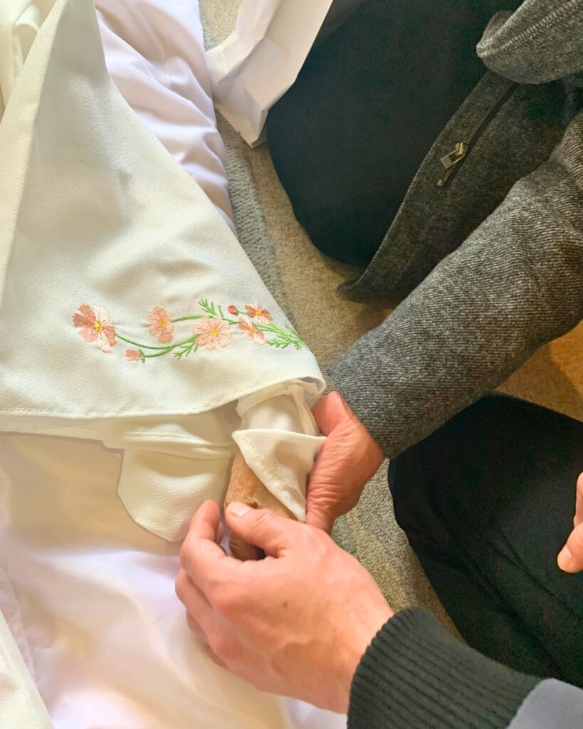 親族の方との最後の握手